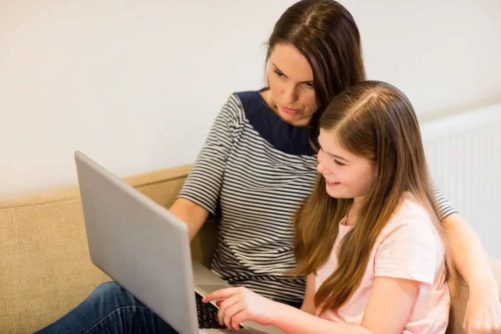 mother teaching daughter